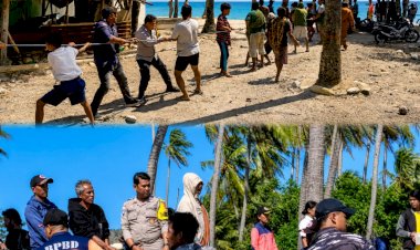 Bhabinkamtibmas-Bersama-Warga-Bantu-Evakuasi-Kapal-Ikan-Tenggelam-di-Pantai-Kebila