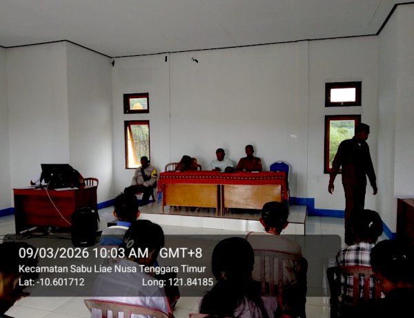 Bhabinkamtibmas Hadiri Musdes Khusus dan Sampaikan Pesan Kamtibmas kepada Warga Desa Mehona